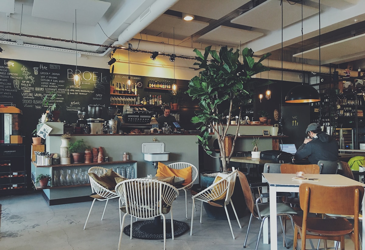 Late kopitiam counter with warm light after dusk in Katong